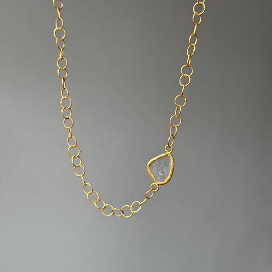 22ct gold chain necklace with a unique Diamond slice pendant on a gray background