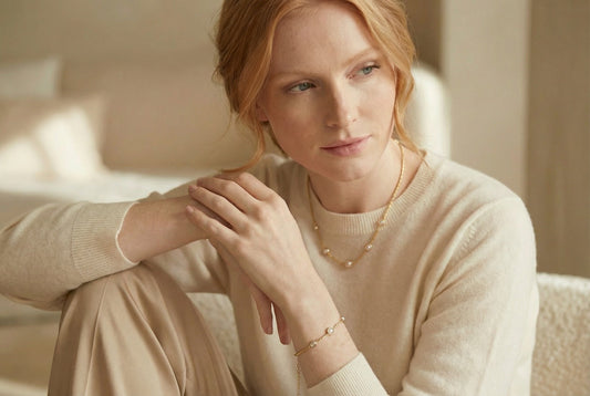 Model wearind diamond sliced golden fine handcrafted jewellery. 