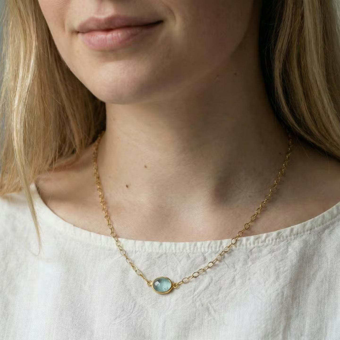 Gold 22ct necklace handcrafted with Aquamarine. Designer is Ram Rijal