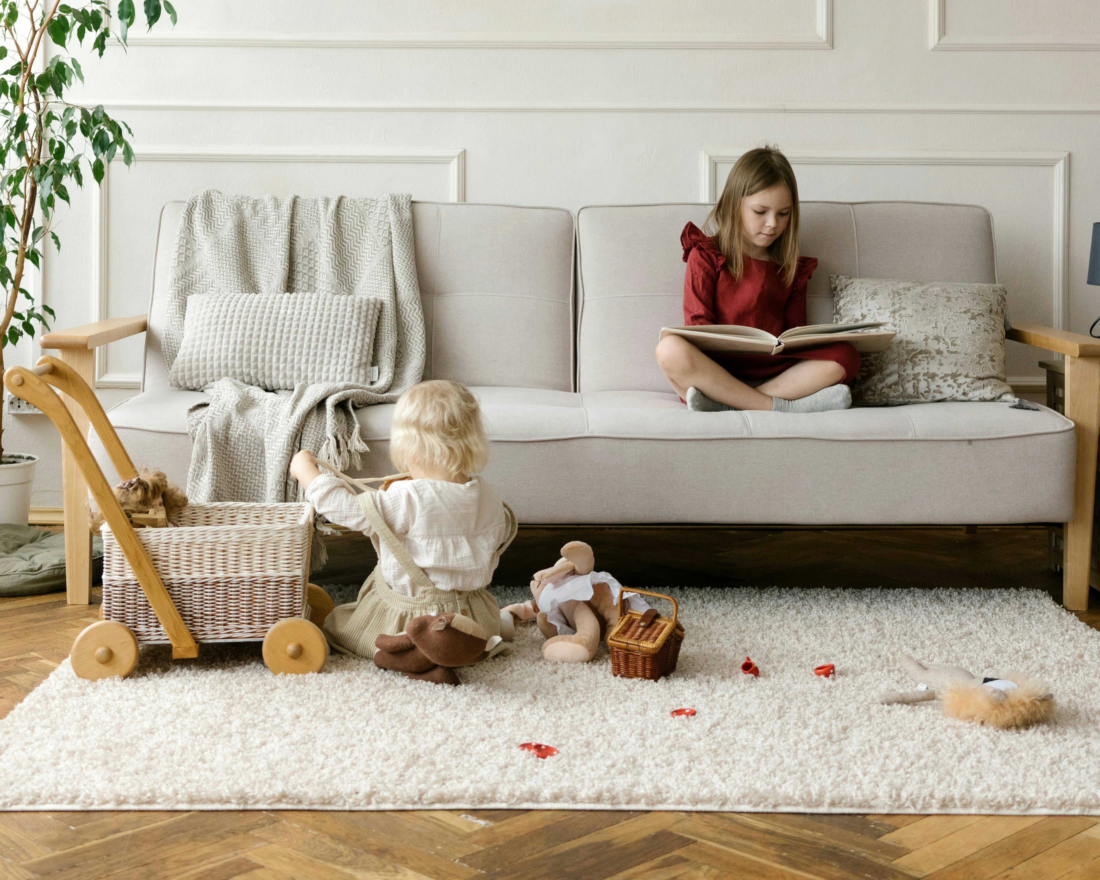 Kids in living room playing with toys