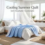Blue cooling summer quilt on a bed in a bright room with large windows.