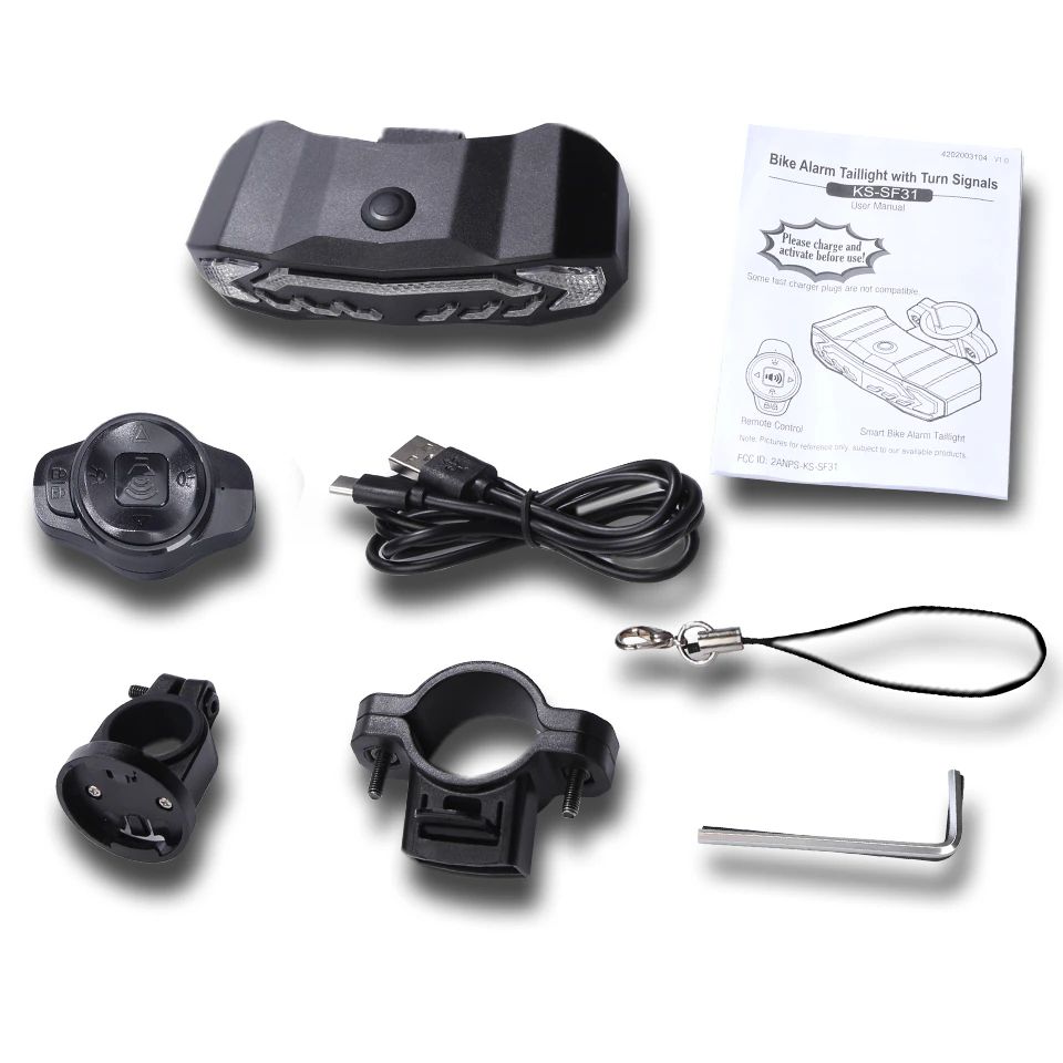 Collection of bike alarm components including a black device, power cable, strap, and mounting bracket on a white background.