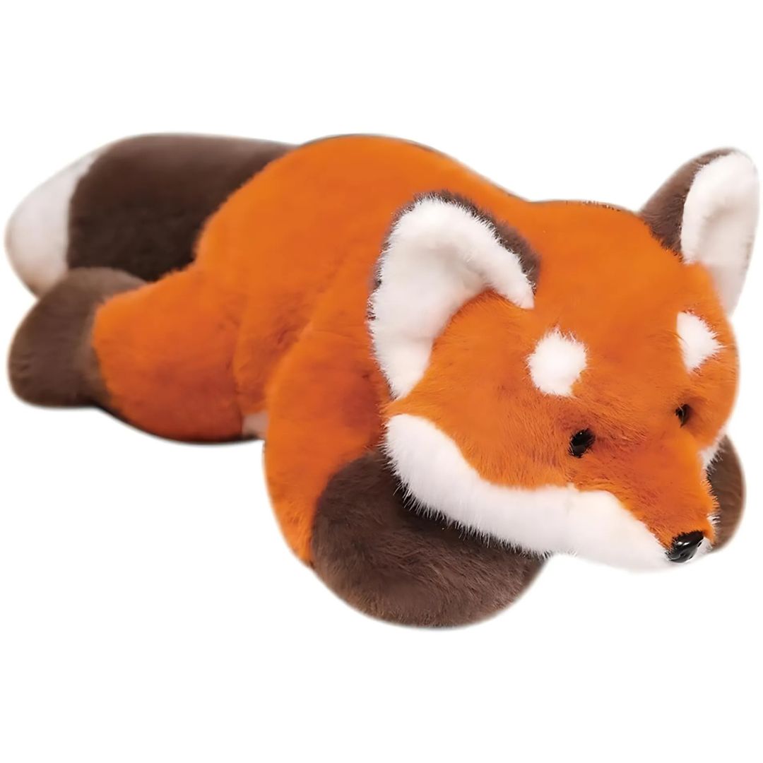 Plush toy fox lying on a white background