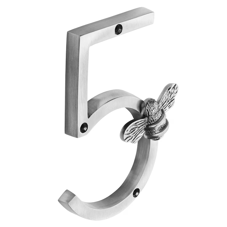 Metallic hook with bee design on a white background