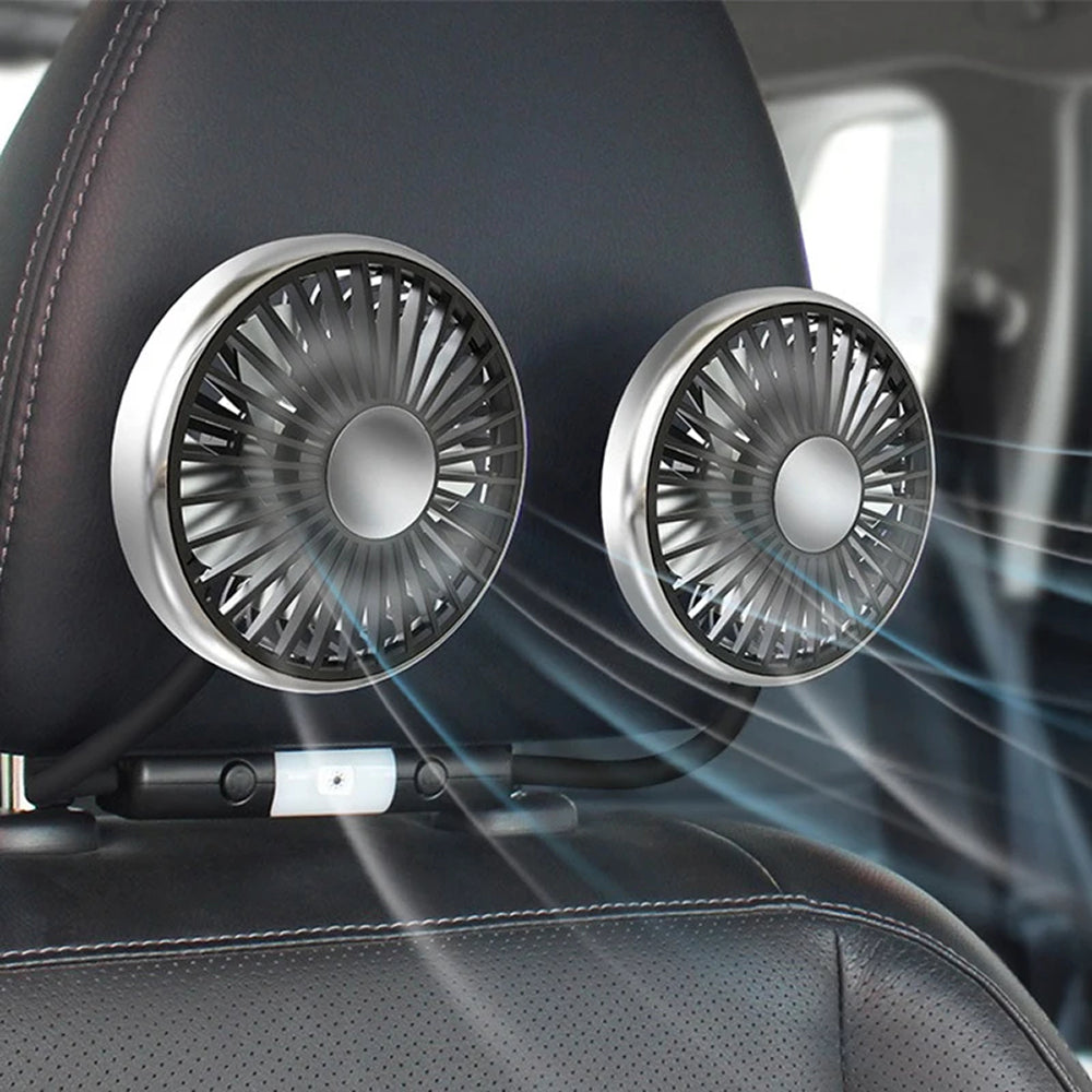 Two car air vent fans mounted on a car's interior dashboard.