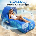 Woman relaxing on a blue sun-shielding beach air lounger with a canopy.