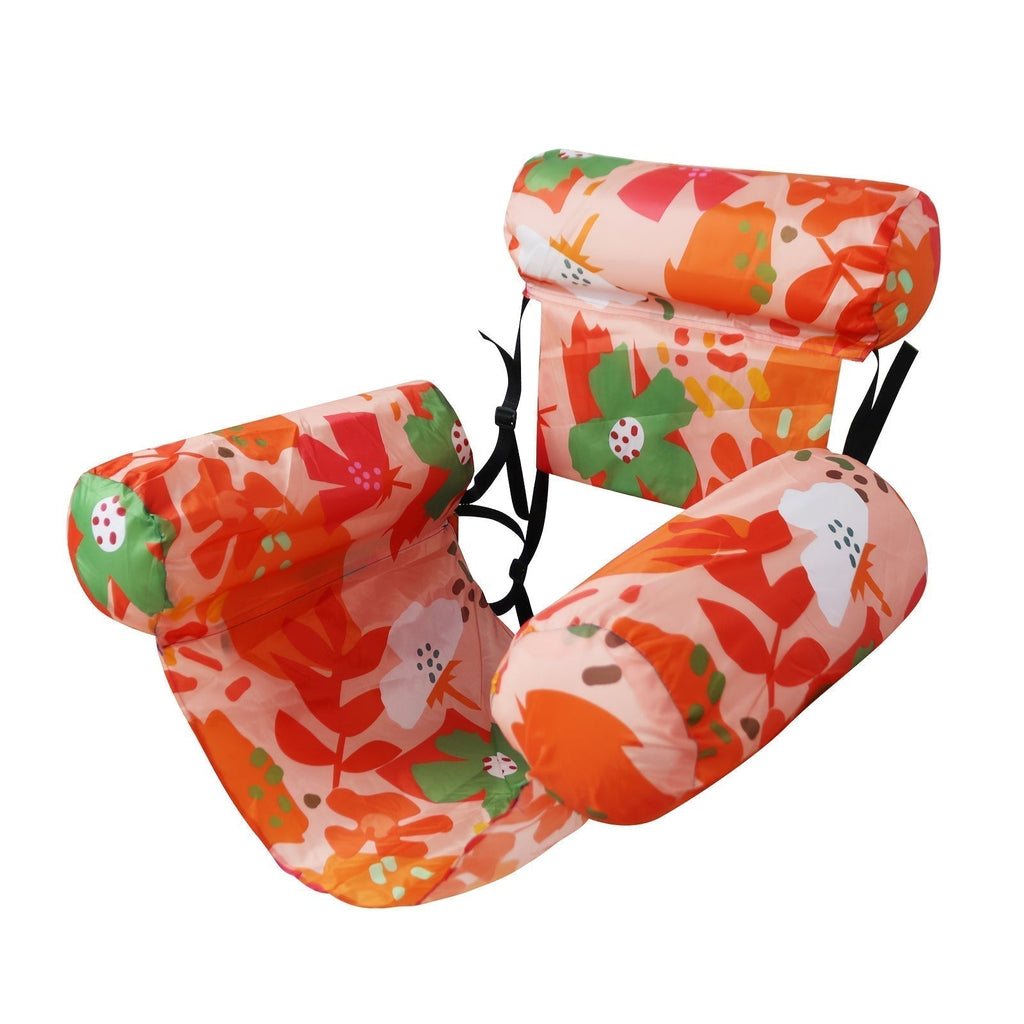 Floral-patterned inflatable seat with a white background