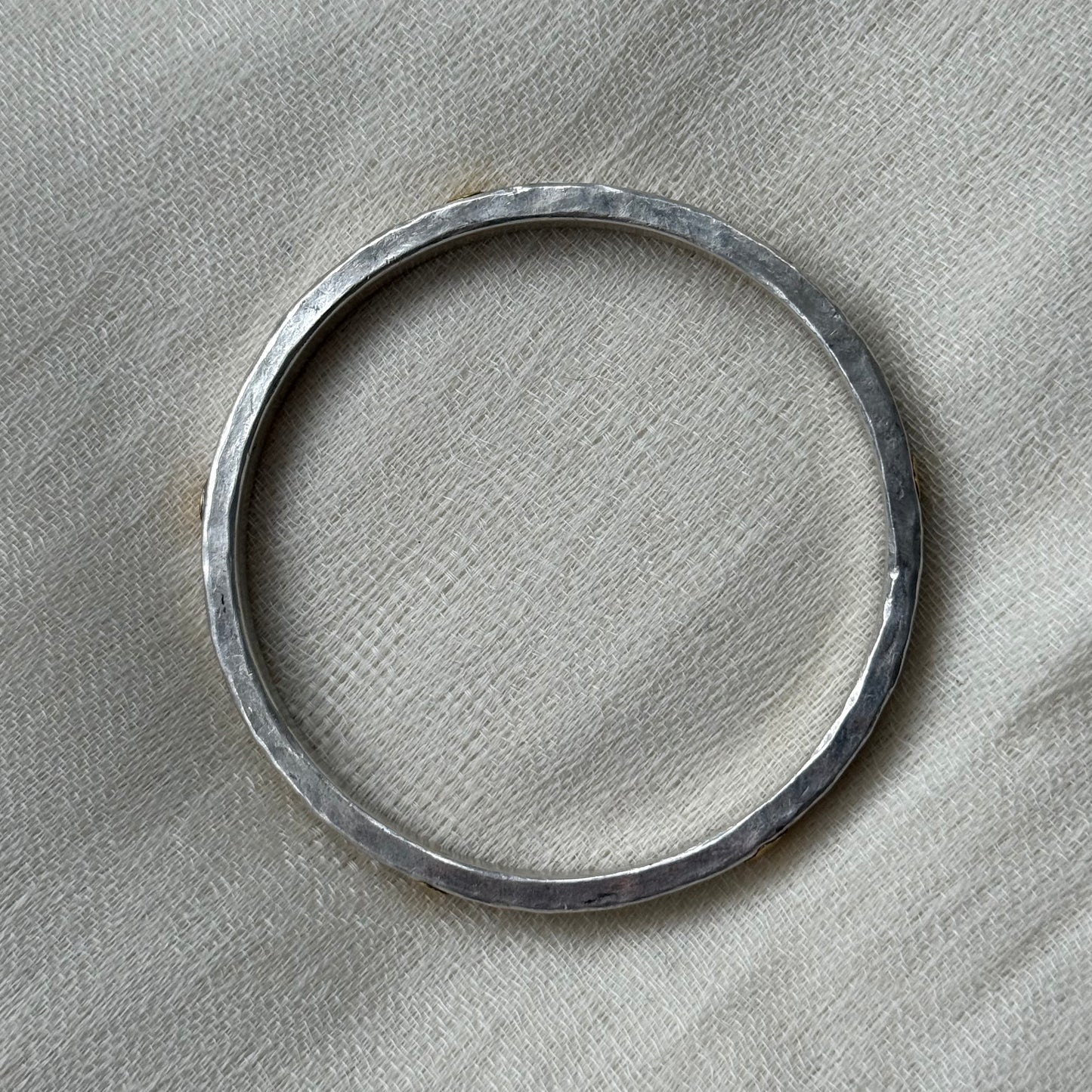 999 Silver 24ct Gold Dots Hammered Bracelet | Ram Rijal