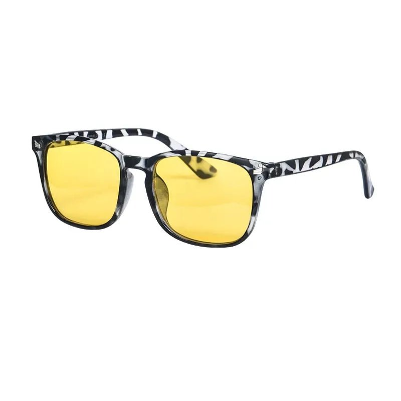 Sunglasses with zebra pattern frame and yellow lenses on a white background