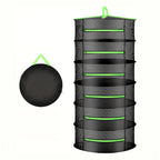 Black mesh plant dryer with green accents on a white background