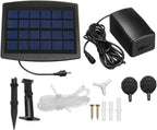 Solar panel, battery, and various components for an outdoor water feature on a white background