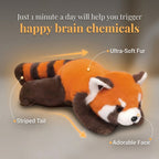 Plush red panda toy with text about happy brain chemicals on a gray background