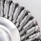 Close-up of braided metal cable on a gray background