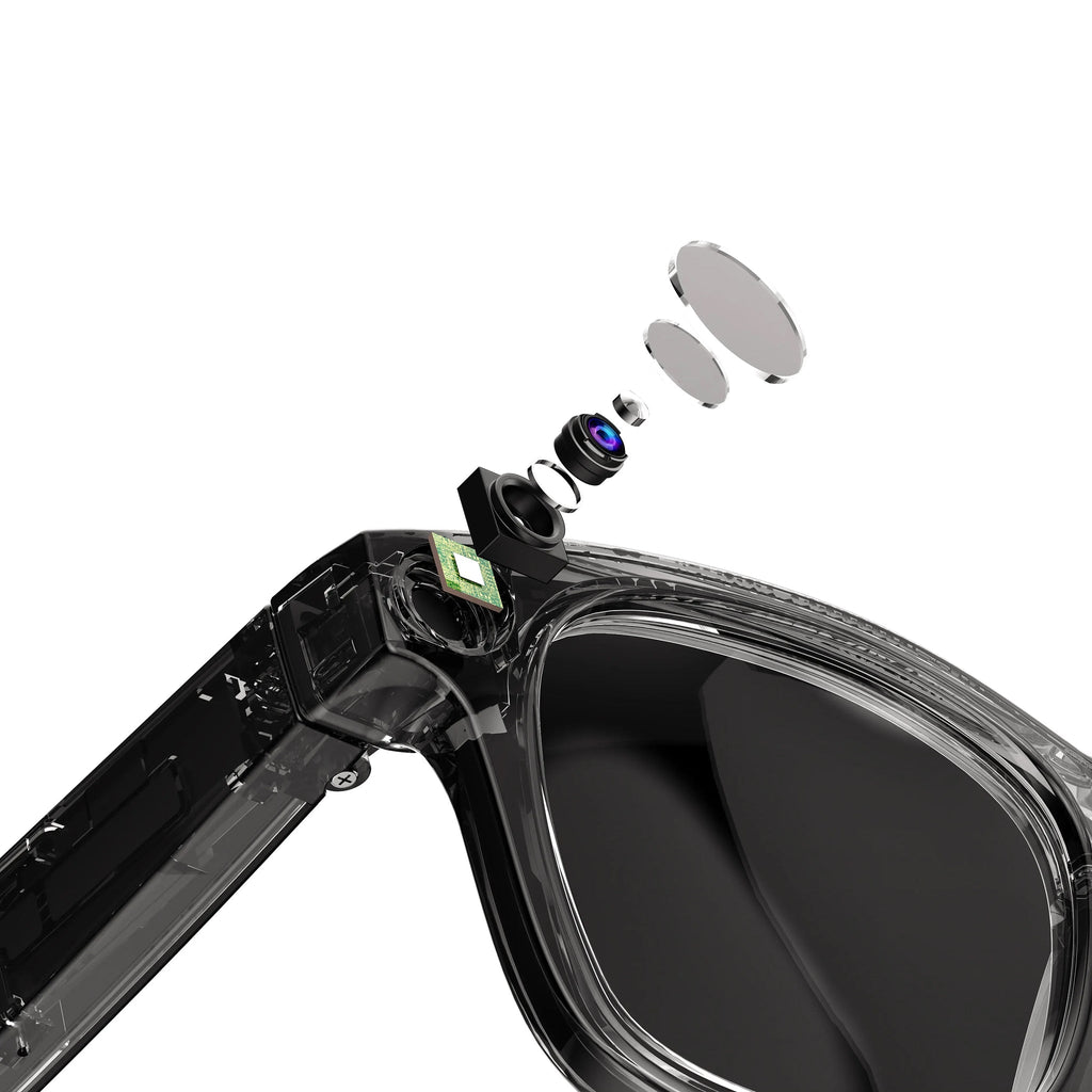 Sunglasses with a clear lens and black frame, showing internal components on a white background.