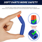 Blue soft dart held by a hand with text about dart safety and Tudyamol Bullets branding.