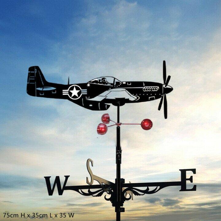 Decorative weathervane shaped like a vintage airplane against a cloudy sky.