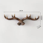 Decorative antlers with measurements on a white background