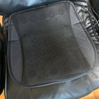 Black mesh seat cushion on a vehicle seat