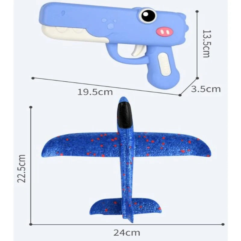 Toy gun with crocodile design and a blue airplane with red dots, showing measurements on a white background.