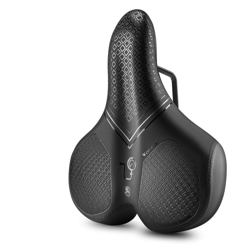 Black bicycle saddle with textured design on a white background