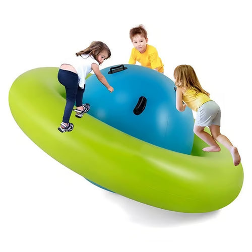 Children playing on a green and blue inflatable boat against a white background