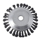 Wire brush wheel with black bristles on a white background