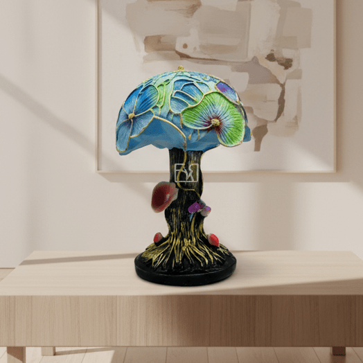 Decorative table lamp with floral design on a wooden surface.