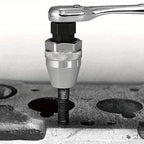 Close-up of a tool being used on a metal surface