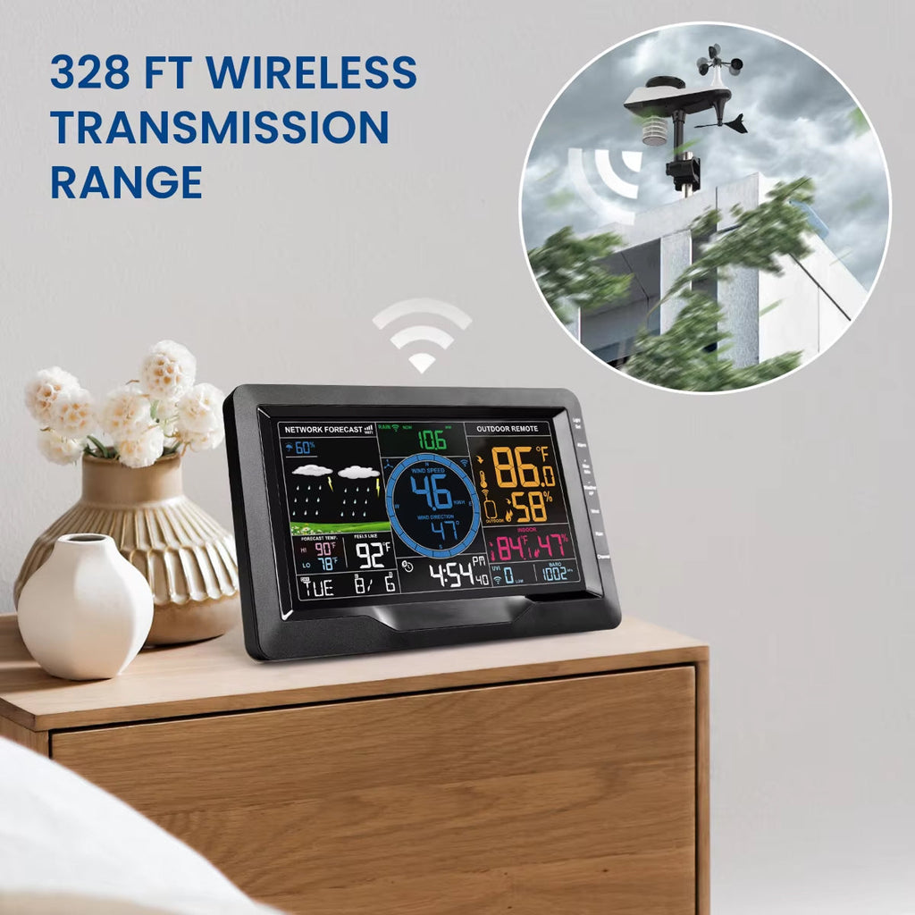 Weather station with digital display on a wooden surface, featuring 328 ft wireless transmission range.