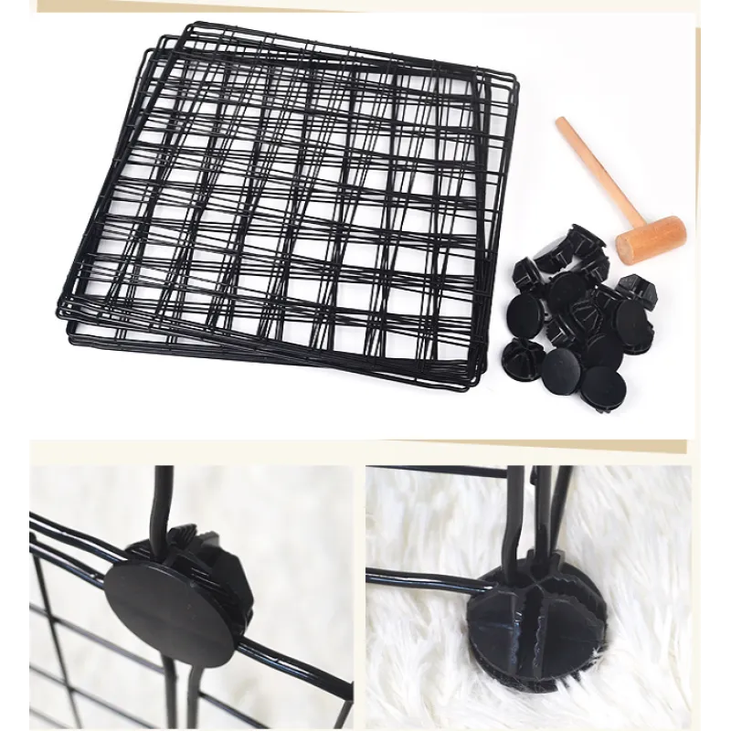 Black wire basket with clips and a wooden tool on a white background
