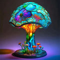 Colorful mushroom-shaped lamp with floral design on a dark background