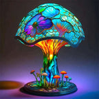 Colorful mushroom-shaped lamp with floral design on a dark background
