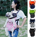 Woman holding a dog in a pink pet carrier with additional pet carriers shown on the right.