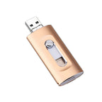 Gold USB flash drive on a white background