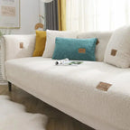 White sofa with colorful cushions in a living room setting