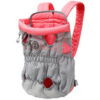Gray and pink baby carrier backpack on a white background
