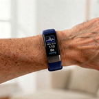 Smartwatch on a wrist displaying health metrics with a blurred background