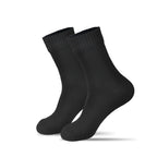 Pair of black socks on a white background