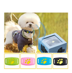 White dog wearing a gray outfit with a blue electronic device and color options displayed.