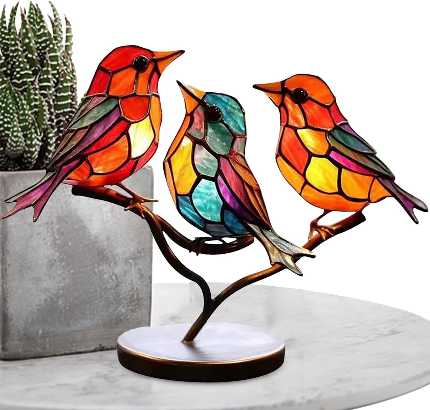 Colorful stained glass bird lamp on a branch with a white background