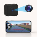 Black camera device with a smartphone displaying a 3D navigation app on a white background