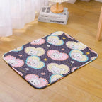 Decorative rug with cartoon dog designs on a wooden floor.
