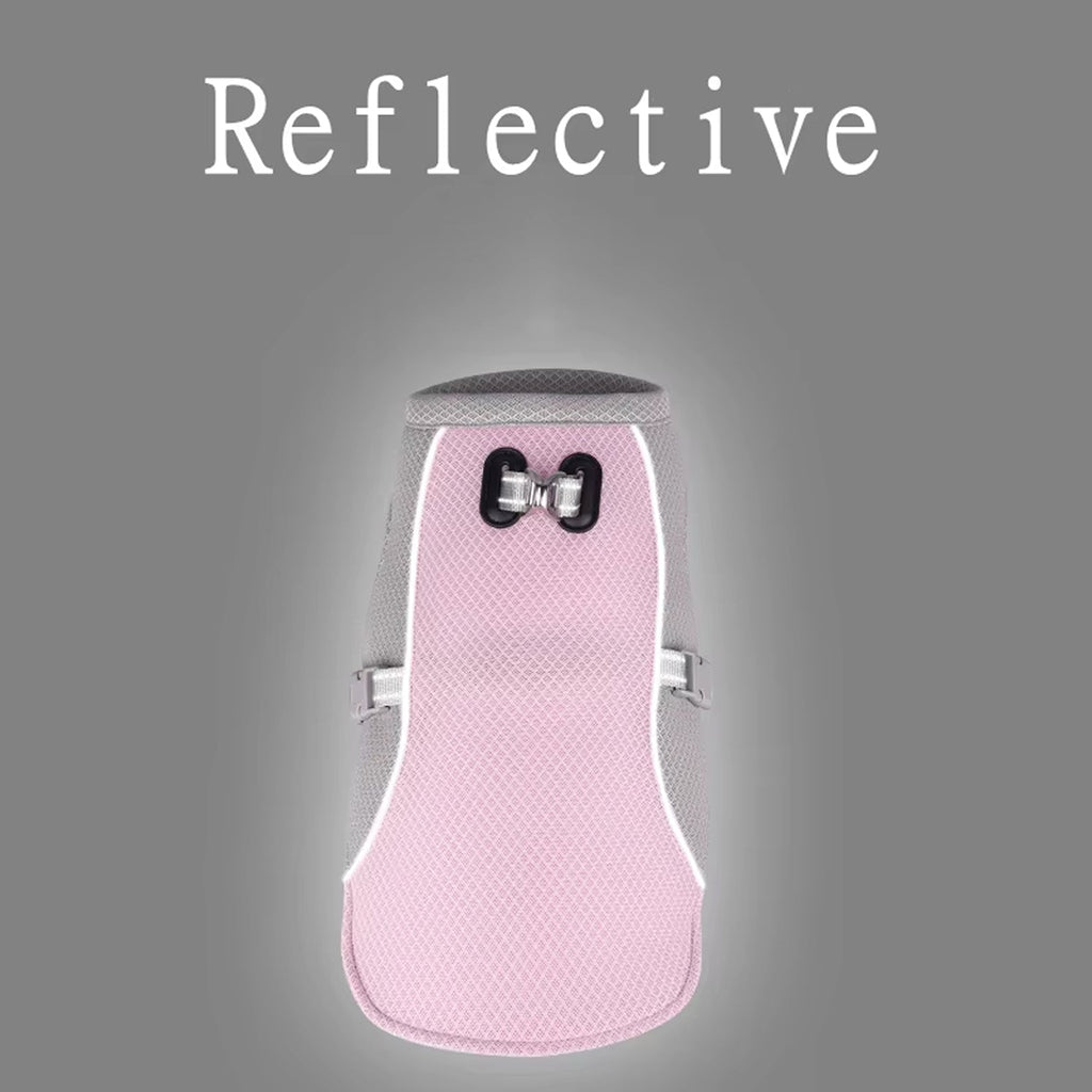 Pink reflective dog vest on a gray background with 'Reflective' text.
