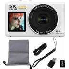 Digital camera with screen, lens, strap, and accessories on a white background