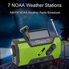 Green and black NOAA weather radio with solar panel on a dark background