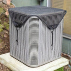 Air conditioning unit with a protective cover outdoors