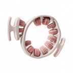 Pink handheld massager with circular design on a white background