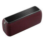 Red portable speaker with black top on a white background