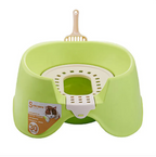 Green pet litter box with a scoop on a white background