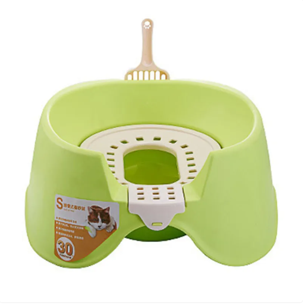 Green pet litter box with a scoop on a white background